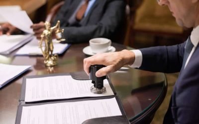 hand-director-company-putting-stamp-document (1)